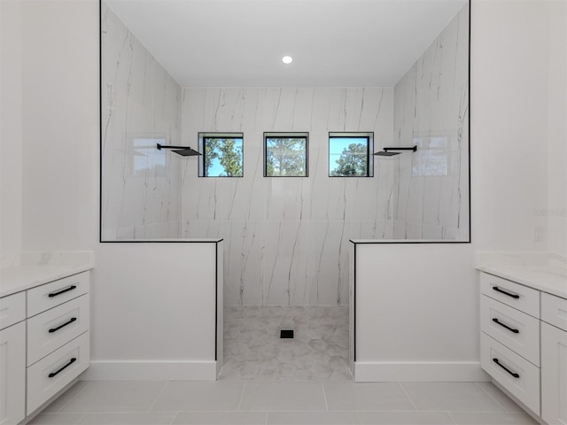 bathroom with vanity and tile floors