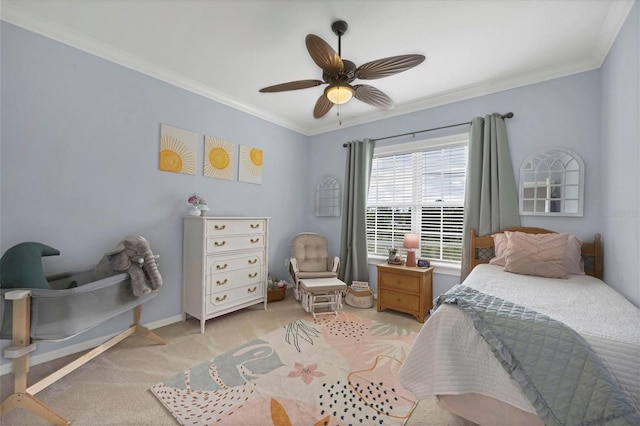 carpeted bedroom featuring ornamental molding and ceiling fan