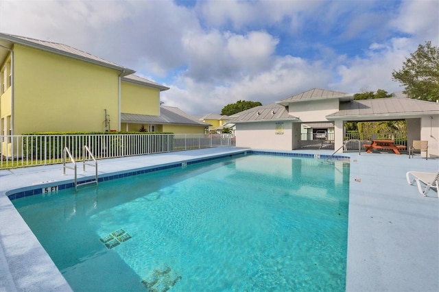 view of swimming pool with a gazebo