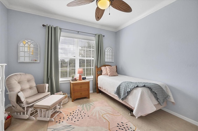 bedroom featuring crown molding, ceiling fan, and light colored carpet