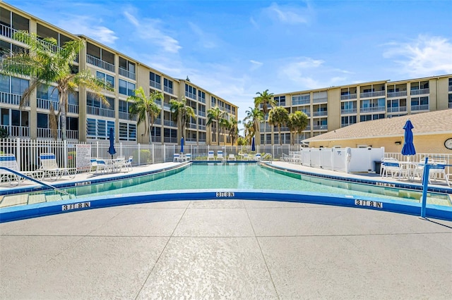 view of swimming pool with a patio