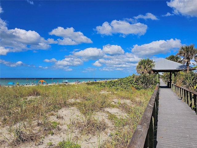 water view featuring a gazebo and a view of the beach