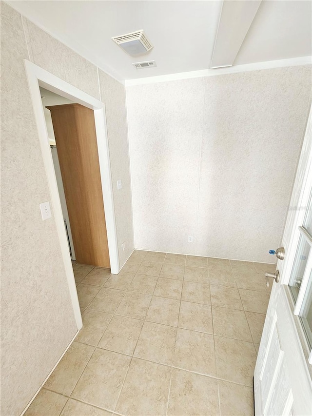 view of tiled spare room