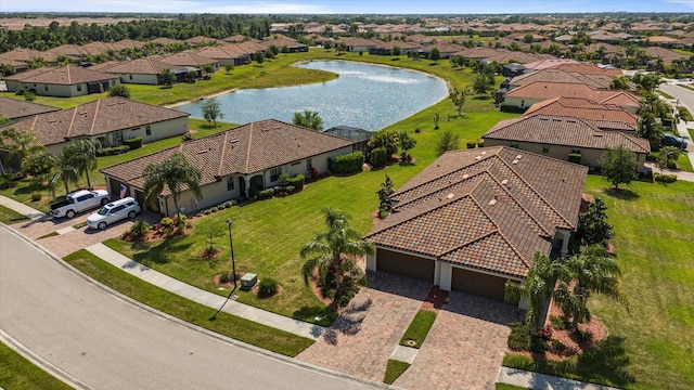 drone / aerial view with a water view