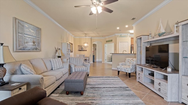 living room featuring ornamental molding, ceiling fan, and light tile floors