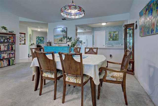 view of carpeted dining room