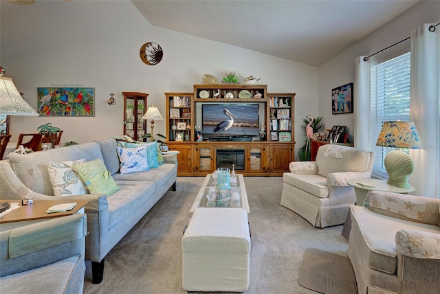 living room with vaulted ceiling and light carpet