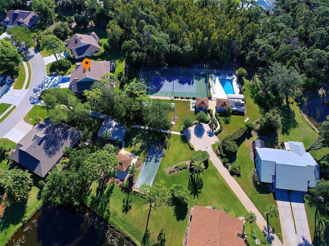 birds eye view of property featuring a water view