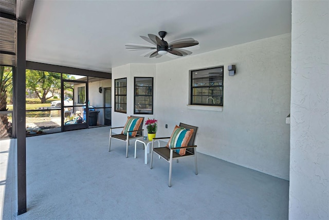 view of patio with ceiling fan