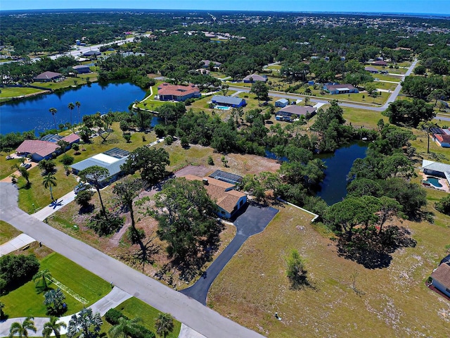 drone / aerial view with a water view