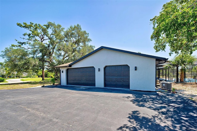 garage featuring cooling unit