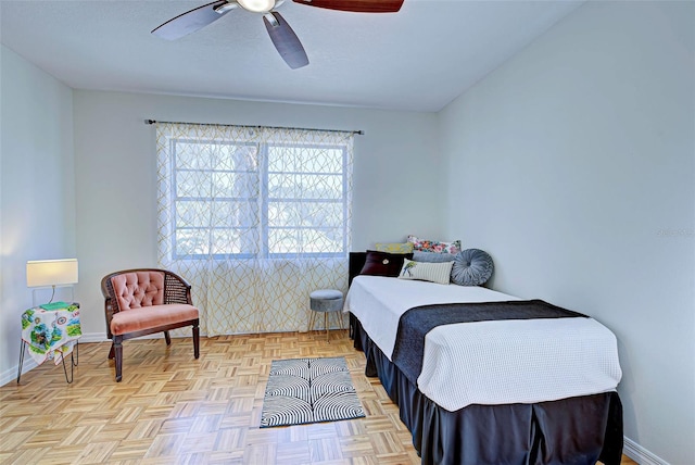 bedroom featuring light parquet flooring and ceiling fan