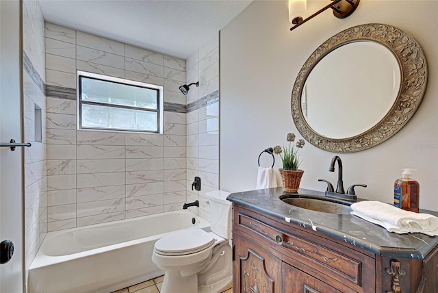 full bathroom with vanity, tiled shower / bath, toilet, and tile patterned floors