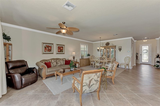 tiled living room with ornamental molding, a healthy amount of sunlight, and ceiling fan with notable chandelier