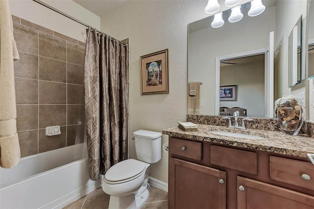 full bathroom with tile flooring, toilet, large vanity, and shower / bathtub combination with curtain