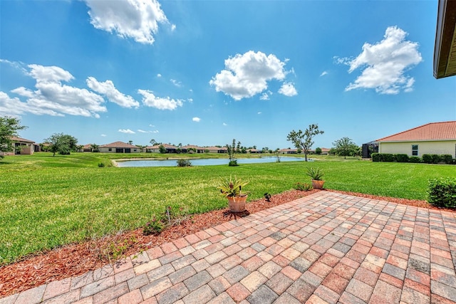 view of patio featuring a water view