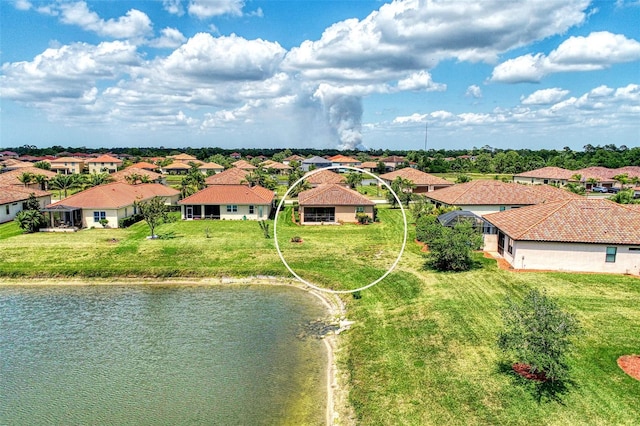 drone / aerial view featuring a water view