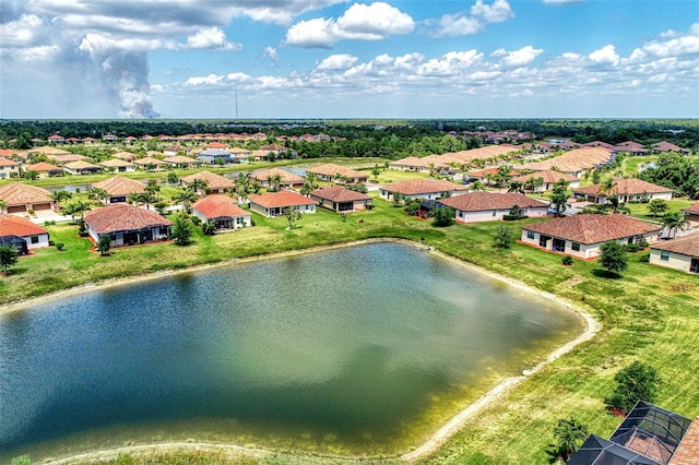 drone / aerial view with a water view