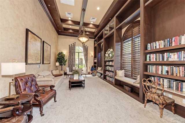 living area with a high ceiling, coffered ceiling, beamed ceiling, carpet floors, and built in shelves