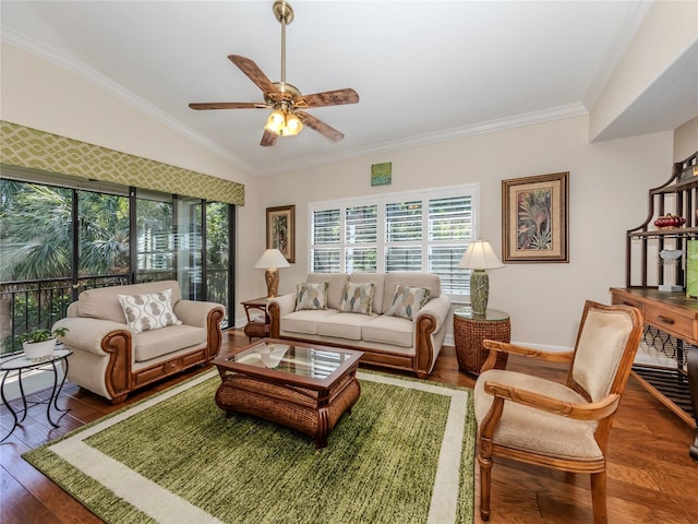 living room featuring ceiling fan, plenty of natural light, dark hardwood / wood-style floors, and vaulted ceiling