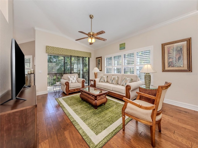 living room featuring ceiling fan, hardwood / wood-style floors, lofted ceiling, and crown molding