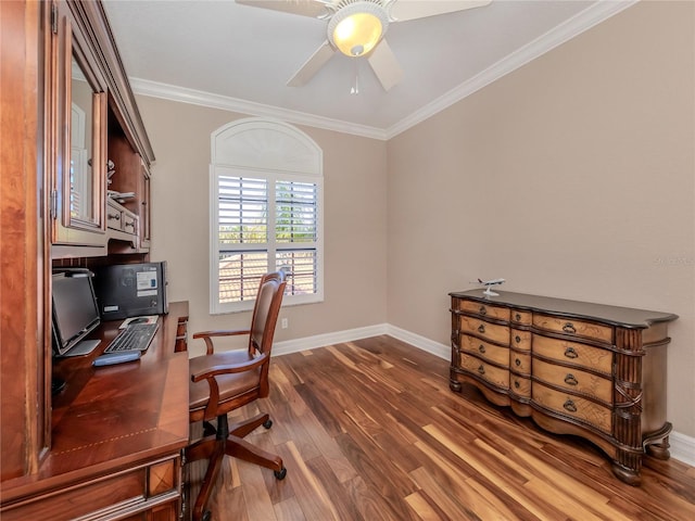 office area with ceiling fan, dark wood-type flooring, and ornamental molding