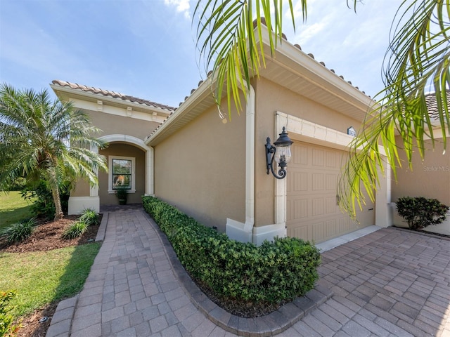 exterior space with a garage