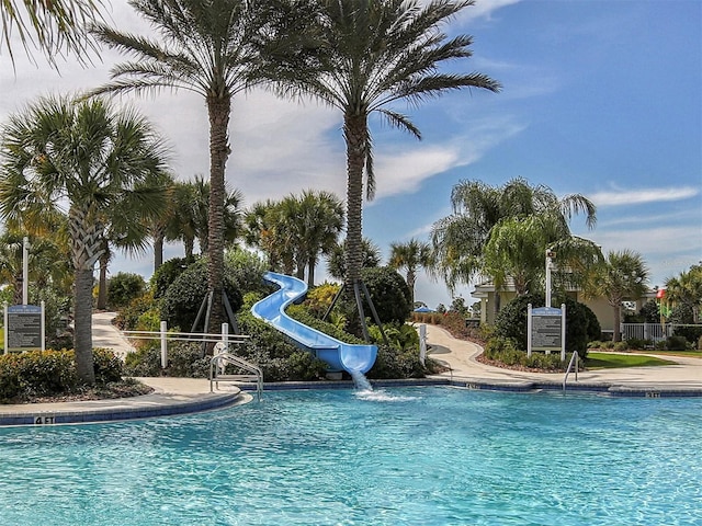 view of pool featuring a water slide