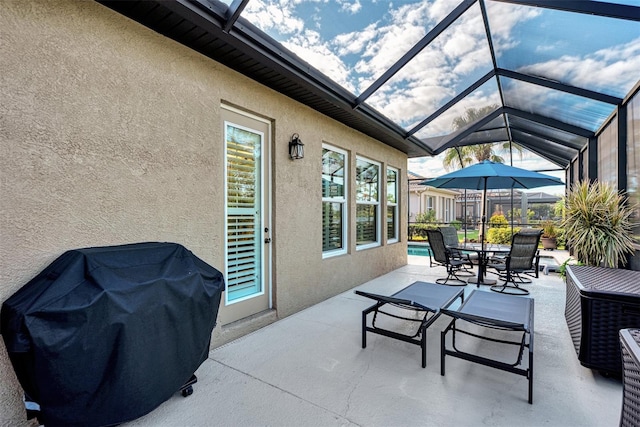 sunroom featuring lofted ceiling