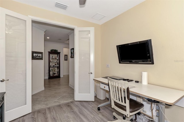 office area featuring light tile flooring