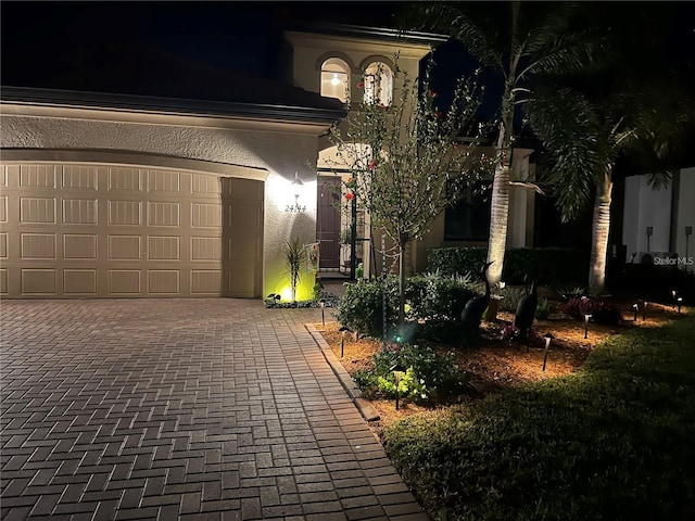 view of front of house with a garage