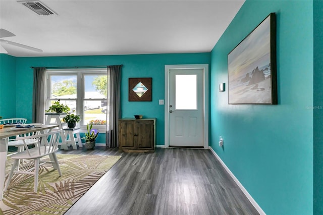 entrance foyer with dark hardwood / wood-style floors