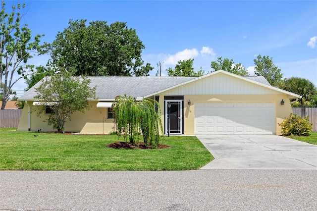 ranch-style home featuring a garage and a front lawn