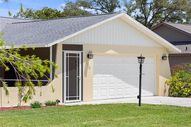 garage with a lawn