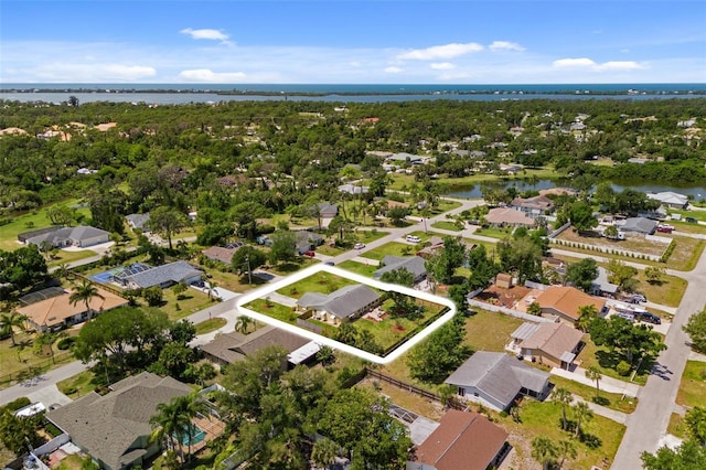 bird's eye view with a water view and a residential view