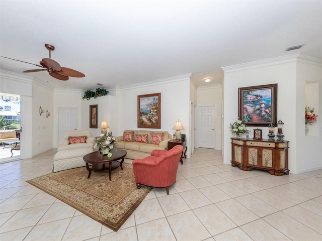 living room with crown molding, ceiling fan, and light tile patterned floors