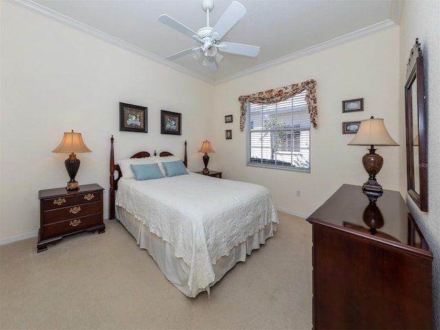 bedroom featuring crown molding, light colored carpet, and ceiling fan