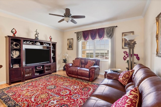 living room featuring ornamental molding, ceiling fan, and hardwood / wood-style flooring