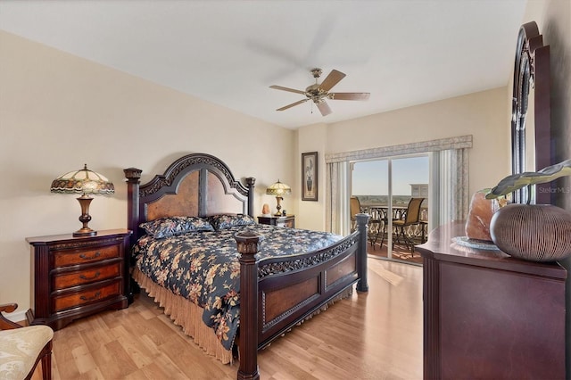 bedroom featuring light hardwood / wood-style flooring, ceiling fan, and access to exterior