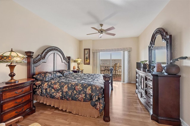 bedroom with wood-type flooring, ceiling fan, and access to exterior