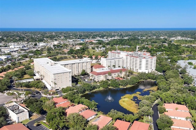 drone / aerial view featuring a water view