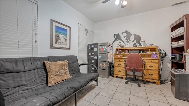 tiled office space with ceiling fan