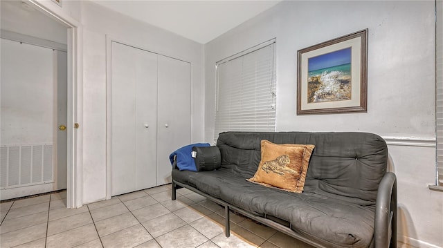 sitting room with light tile floors