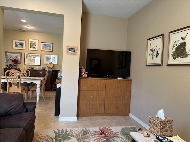 living room with light tile floors