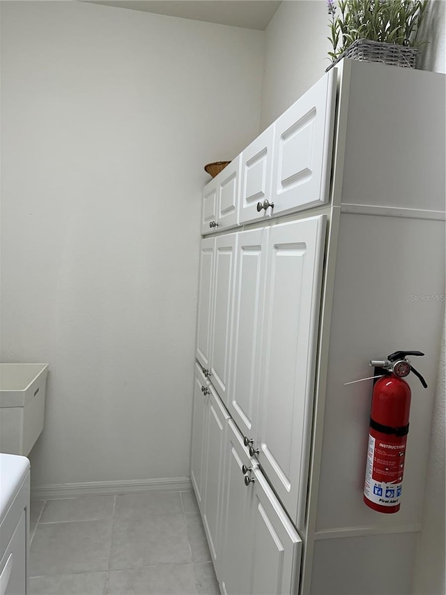 bathroom featuring tile flooring