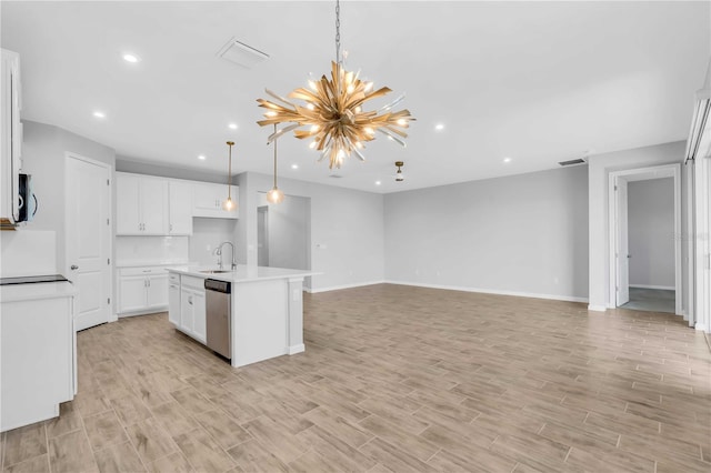 kitchen featuring pendant lighting, a kitchen island with sink, sink, stainless steel dishwasher, and white cabinetry