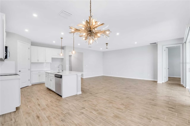 kitchen featuring a kitchen island with sink, white cabinets, sink, stainless steel dishwasher, and decorative light fixtures