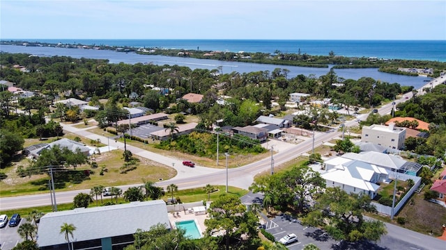 drone / aerial view featuring a water view