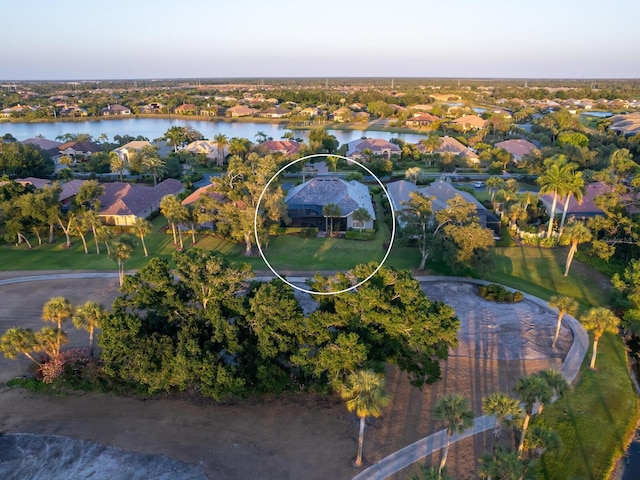 drone / aerial view with a water view