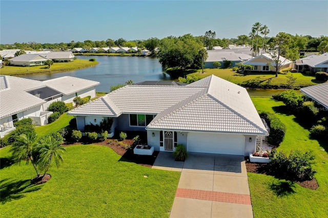 drone / aerial view featuring a water view